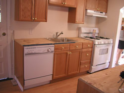 Remodeled kitchen with new cabinets and appliances